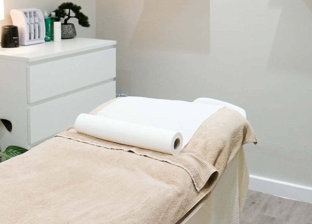 Elegant treatment room at Kaye at Nova, Clitheroe, England, GB, with a cozy massage table.