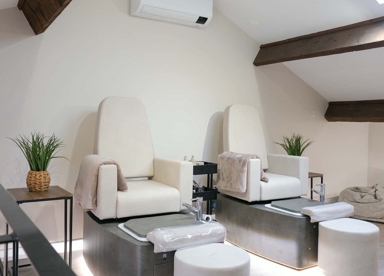 Elegant pedicure chairs at Kaye at Nova in Clitheroe, England, GB. Experience premium foot care in style.