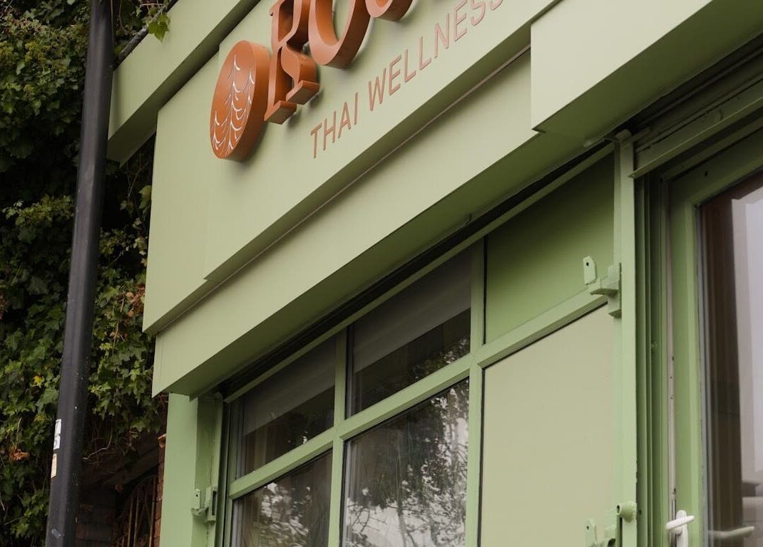 Front view of Roukh Thai Wellness Prestwich, a tranquil green building in Manchester, England, GB.