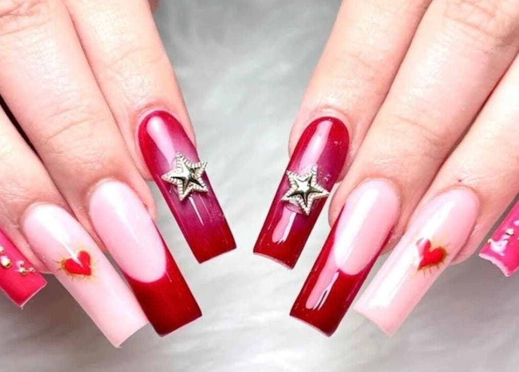 Elegant manicure with stars and hearts at HD Nails, Portland, Oregon, US.