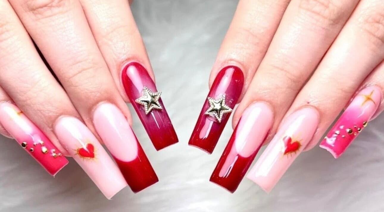 Elegant manicure with stars and hearts at HD Nails, Portland, Oregon, US.