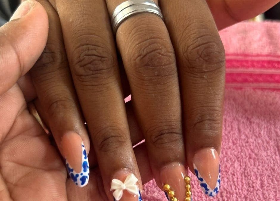 Elegant nail art with bows and beads at Creative Theia in Georgetown, Demerara-Mahaica, GY.