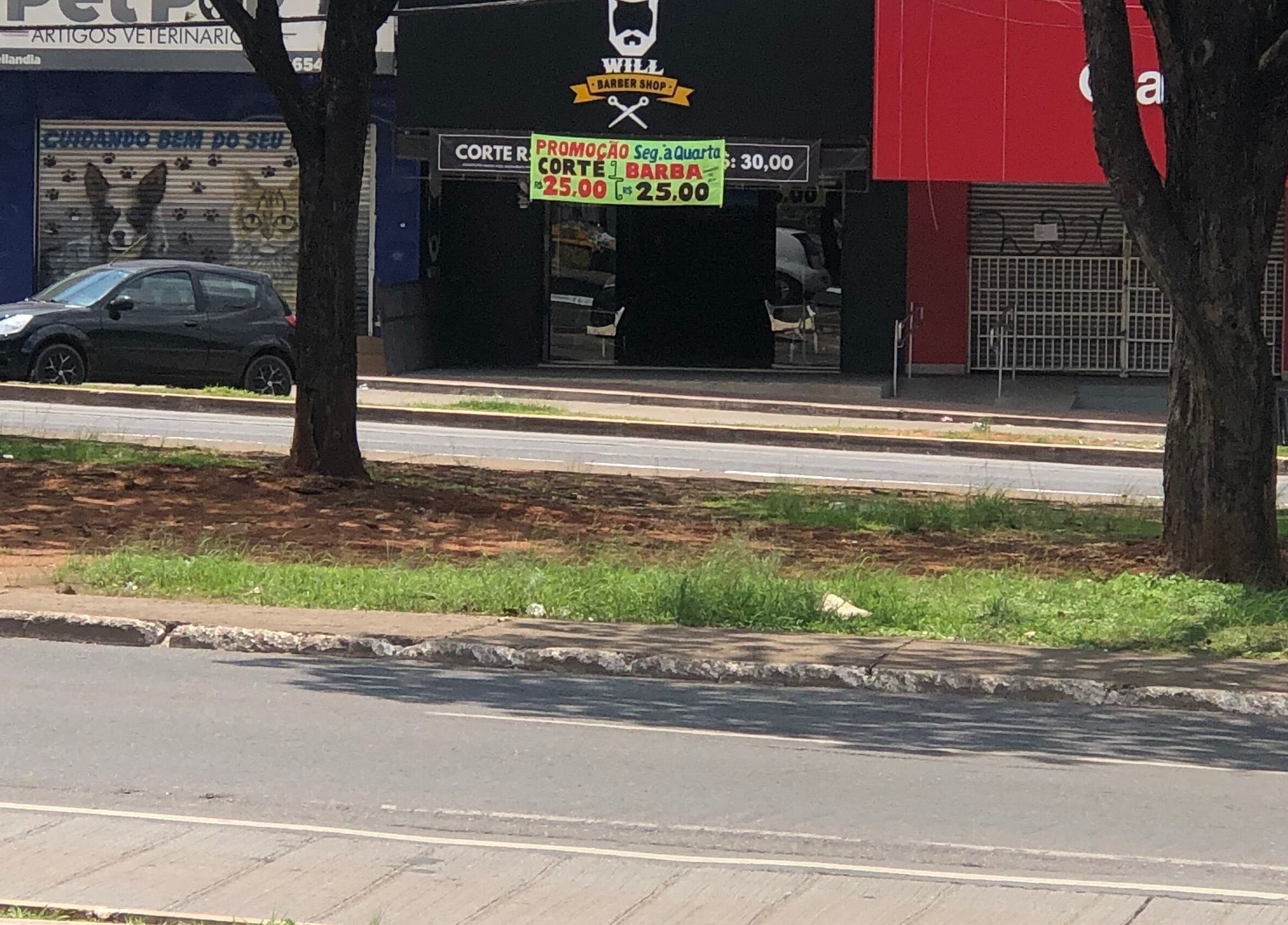 Frente da Will Barber em Distrito Federal, BR, com promoções visíveis na fachada.