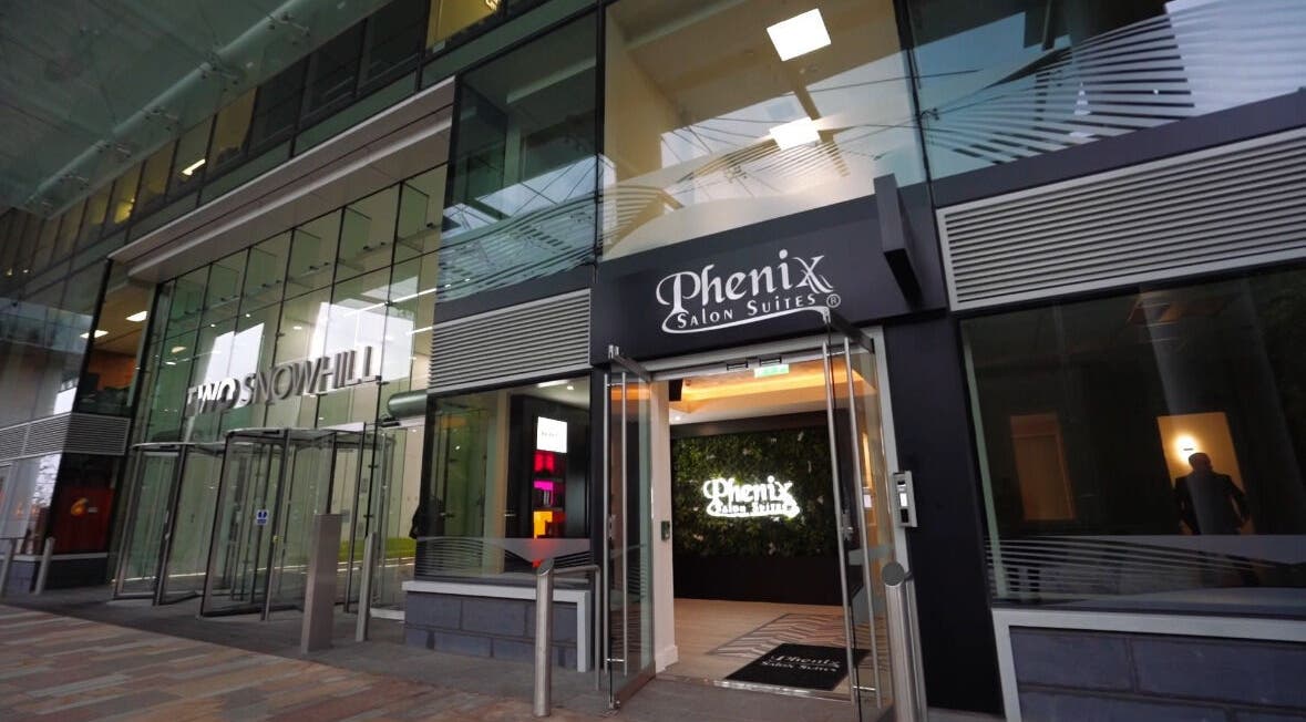 Entrance of Èvora Haus skin & Aesthetics in Birmingham, England, GB, showcasing modern glass design.