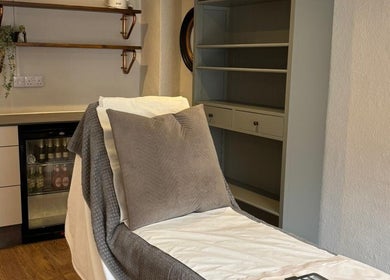 Luxurious spa treatment room at Luxury Bubble Fordingbridge, England, GB with plush treatment bed.