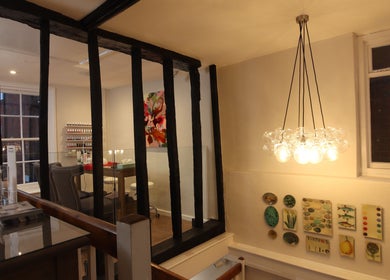 Modern chic hallway leading to a cozy, elegant salon at Luxury Bubble Fordingbridge, Fordingbridge, England, GB.