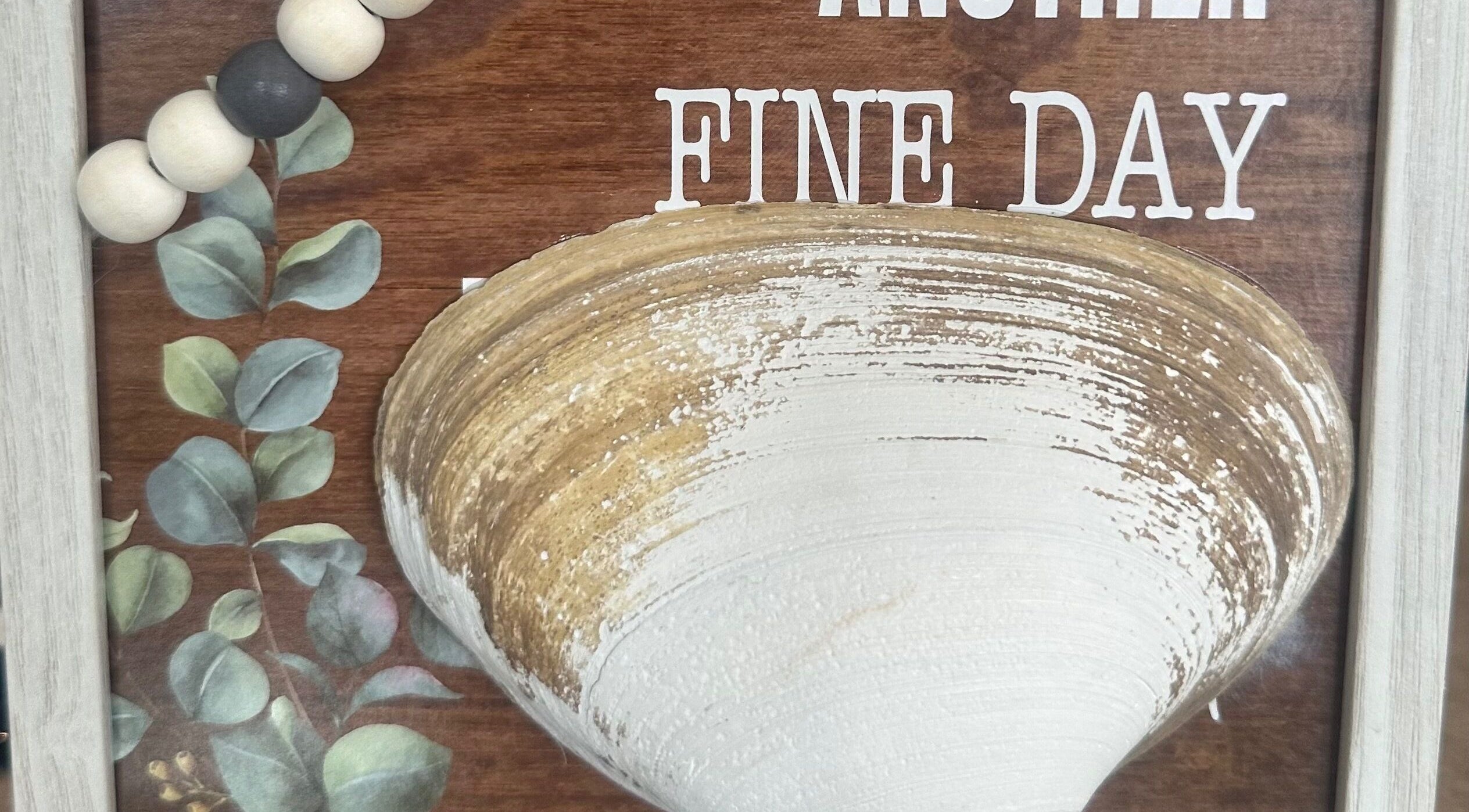 Rustic style decor at S&B CLUB, Richmond Hill, Ontario, CA featuring greenery and intricate pottery design.