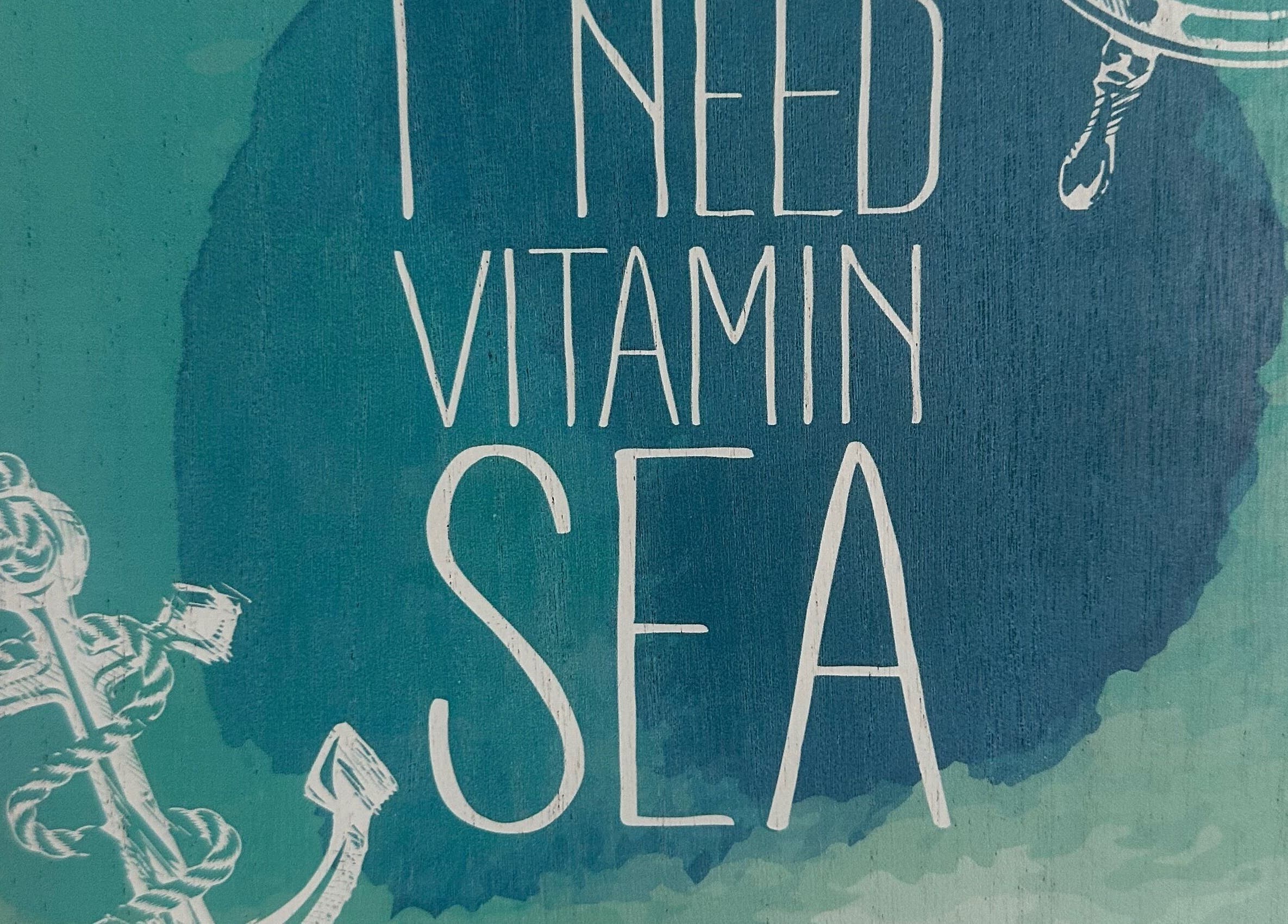 Ocean-themed decor with 'I Need Vitamin Sea' sign at S&B CLUB, Richmond Hill, Ontario, CA.