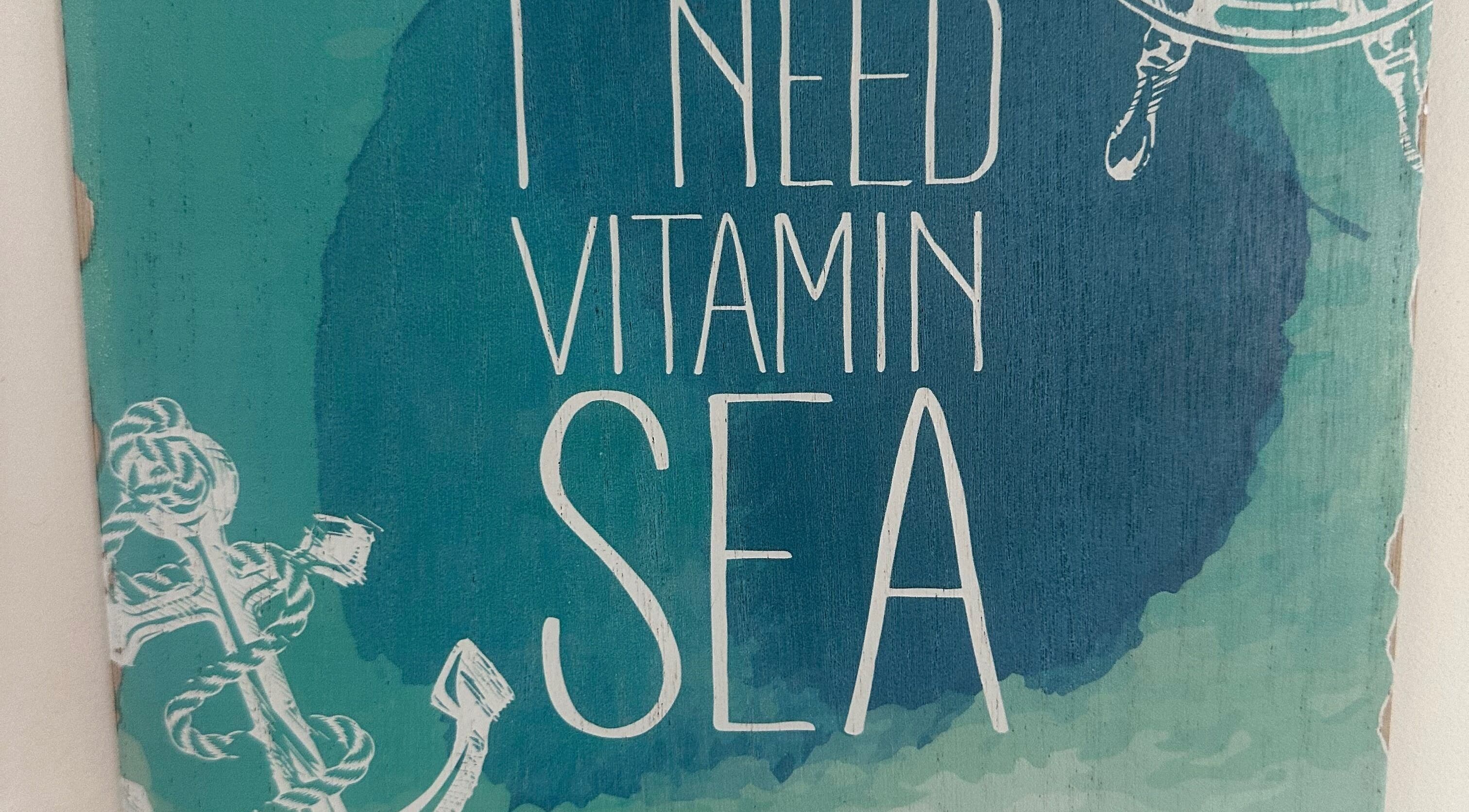 Ocean-themed decor with 'I Need Vitamin Sea' sign at S&B CLUB, Richmond Hill, Ontario, CA.