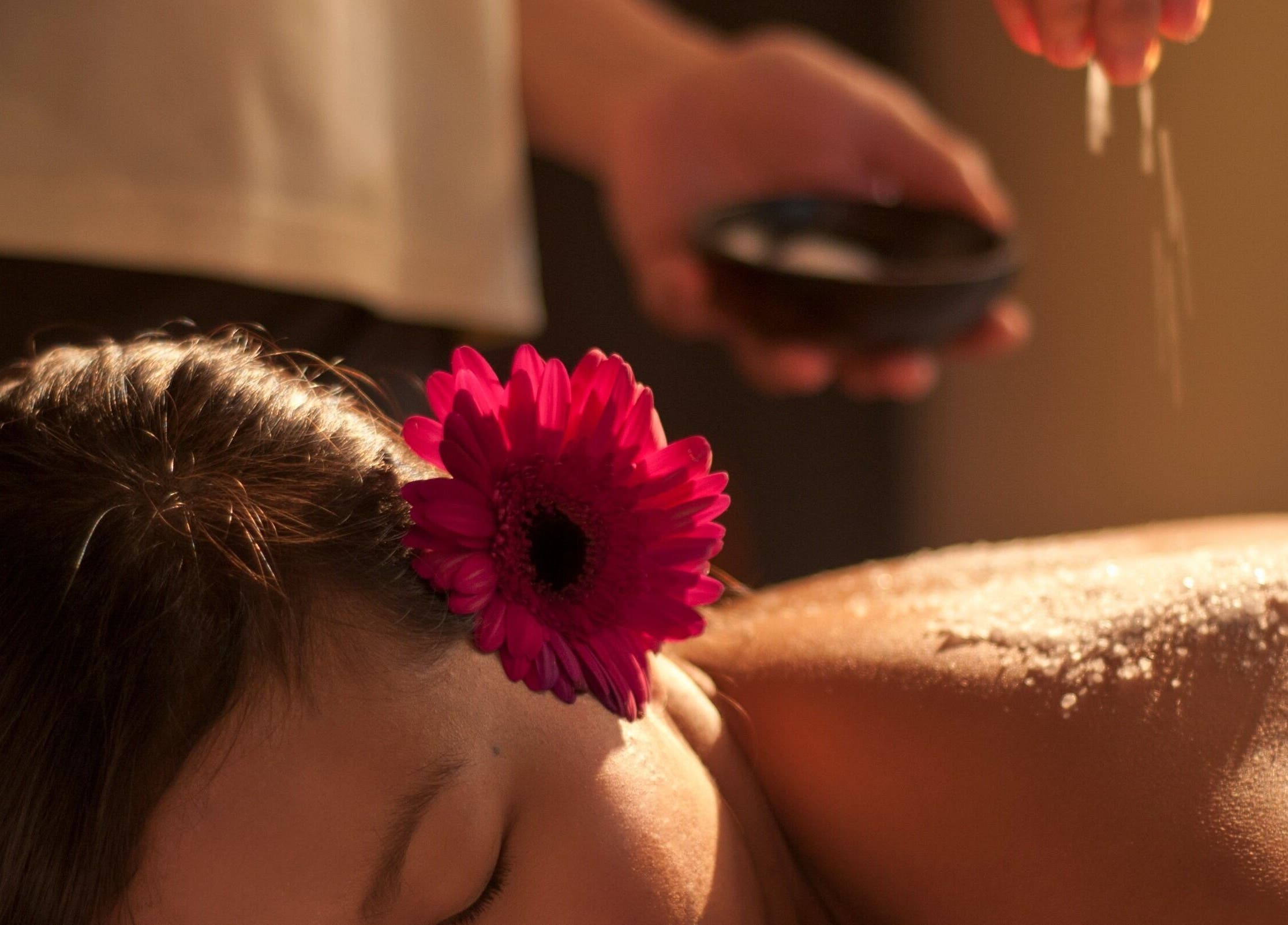 Relaxing spa treatment at Aspa, Kepulauan Riau, Kepulauan Riau, ID featuring flower accents.