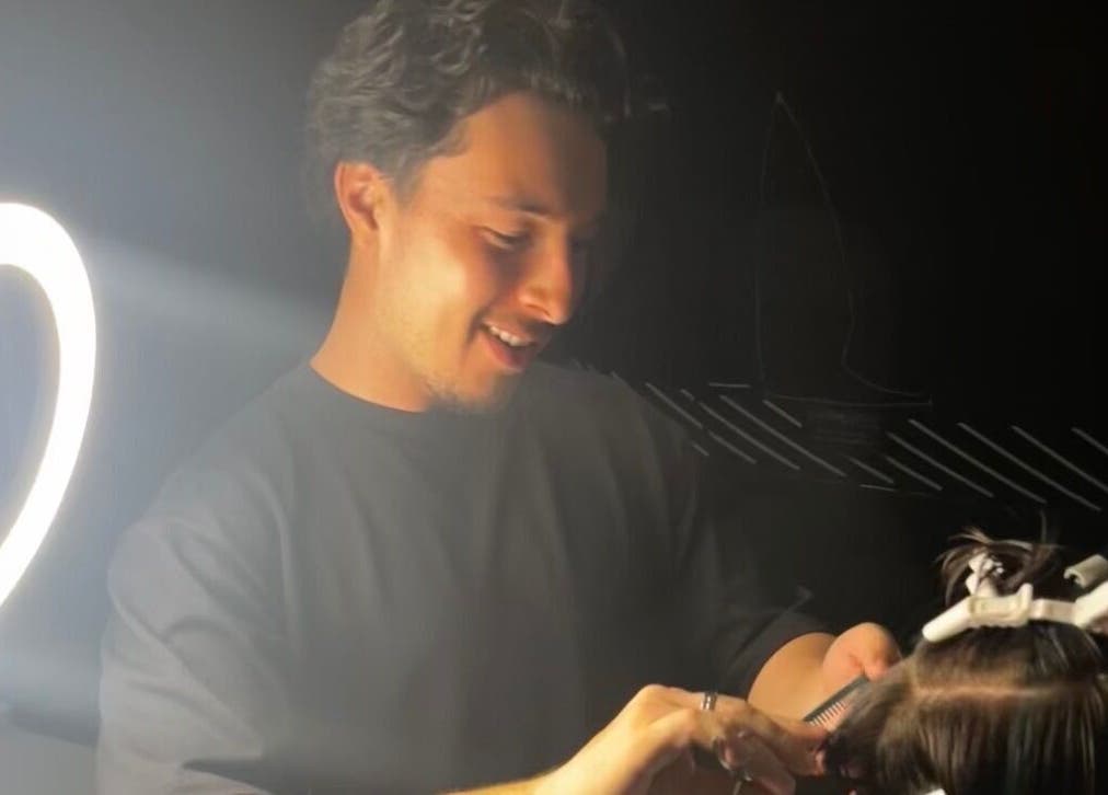 Travis Keech - Mobile Barber crafting a haircut in Currimundi, Queensland, AU under professional lighting.