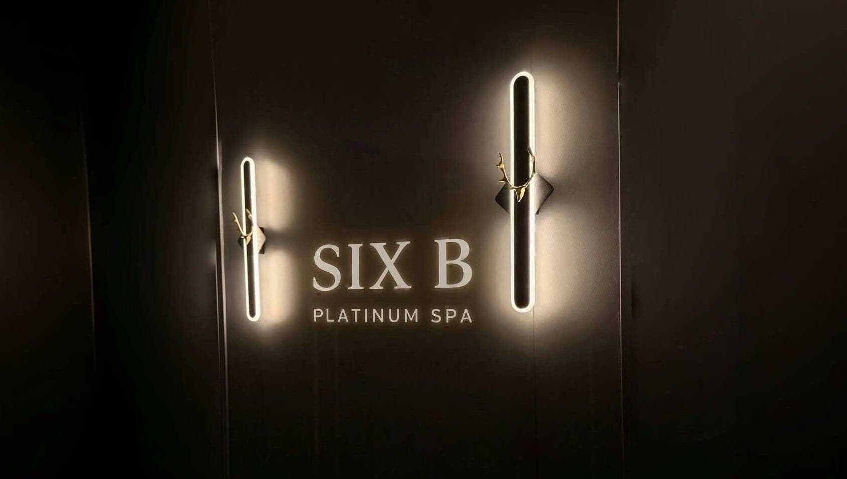 Entrance of Six B Platinum spa with illuminated lights in Zetland, New South Wales, AU.