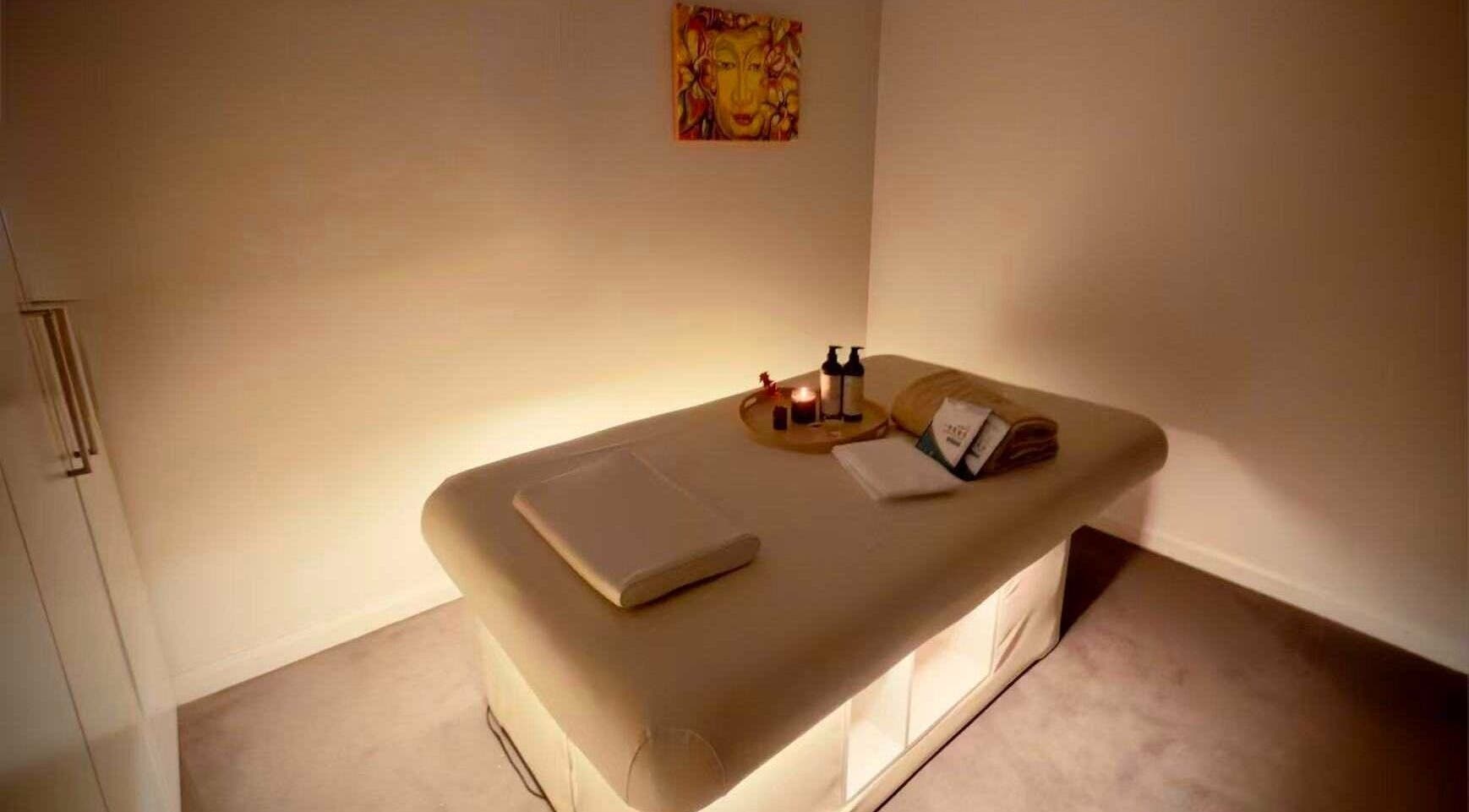 Cozy massage room at Six B Platinum, Zetland, New South Wales, AU with soft lighting and warm ambience.
