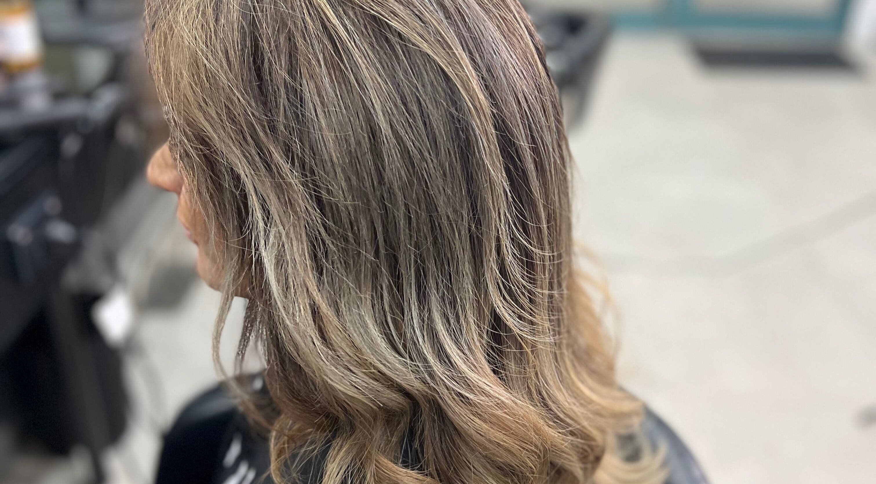 Elegant wavy hairstyle at Hair By Yamen, Melbourne, Victoria, AU, capturing sophisticated beauty.