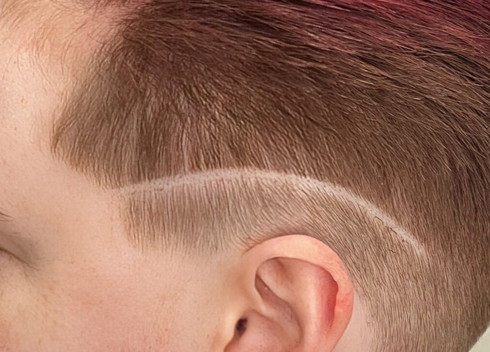 Clean undercut hairstyle at Hair By Yamen, Melbourne, Victoria, AU, showcasing precise styling.