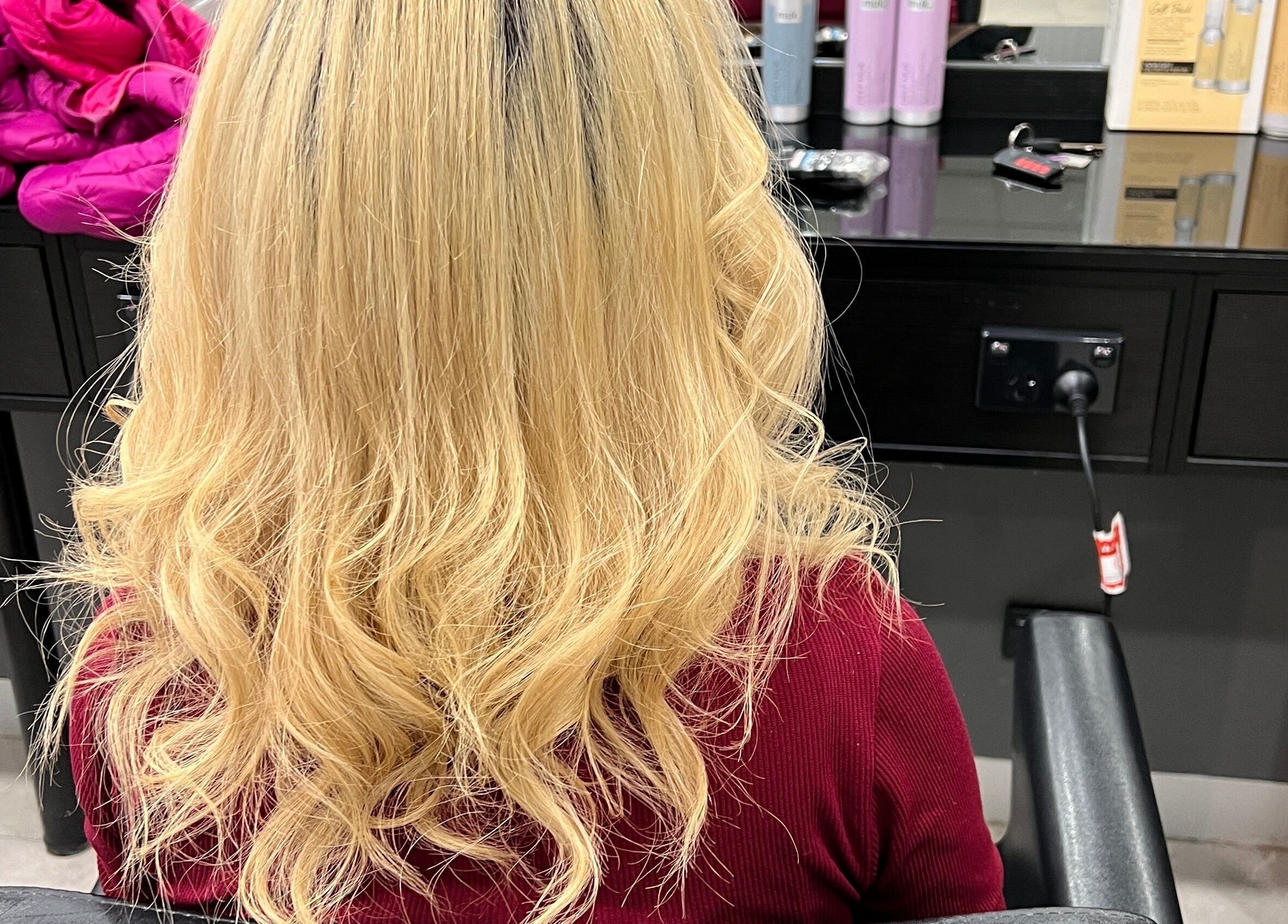 Beautiful blonde curls styled at Hair By Yamen in Melbourne, Victoria, AU. A perfect salon transformation.