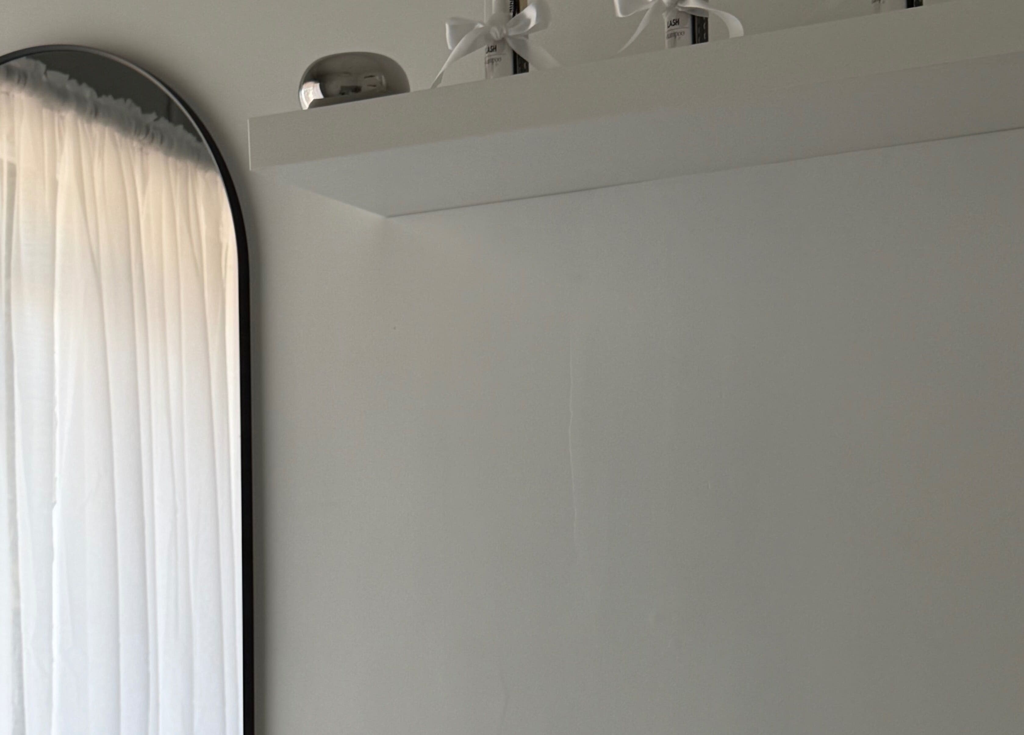 Elegant mirror and decor at Wildflower Ink, Mount Hawthorn, Western Australia, AU.