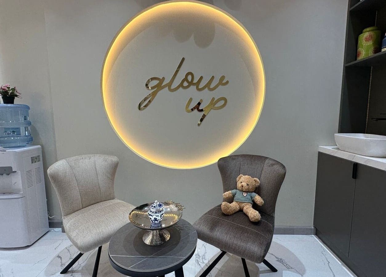 Inviting seating with 'glow up' decor at Allenora Beauty Lounge, Abu Dhabi, AE.