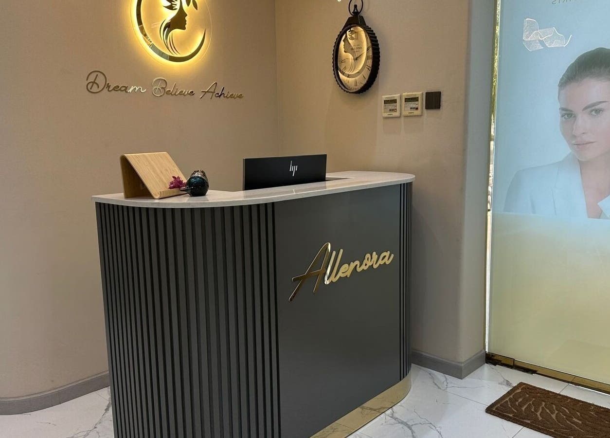Reception area of Allenora Beauty Lounge in Abu Dhabi, AE, featuring elegant decor and branding.