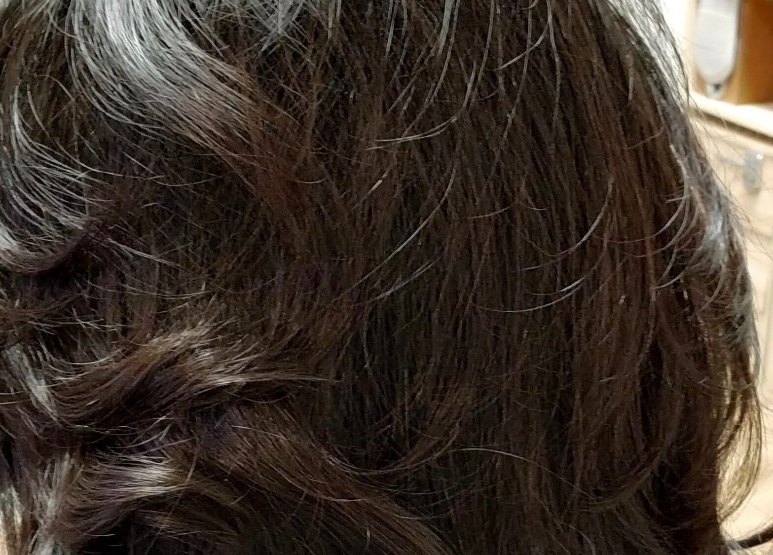 Elegant brunette hairstyle at Nicolas Mark hairdressing, Newcastle upon Tyne 5 Saville Place, England, GB.