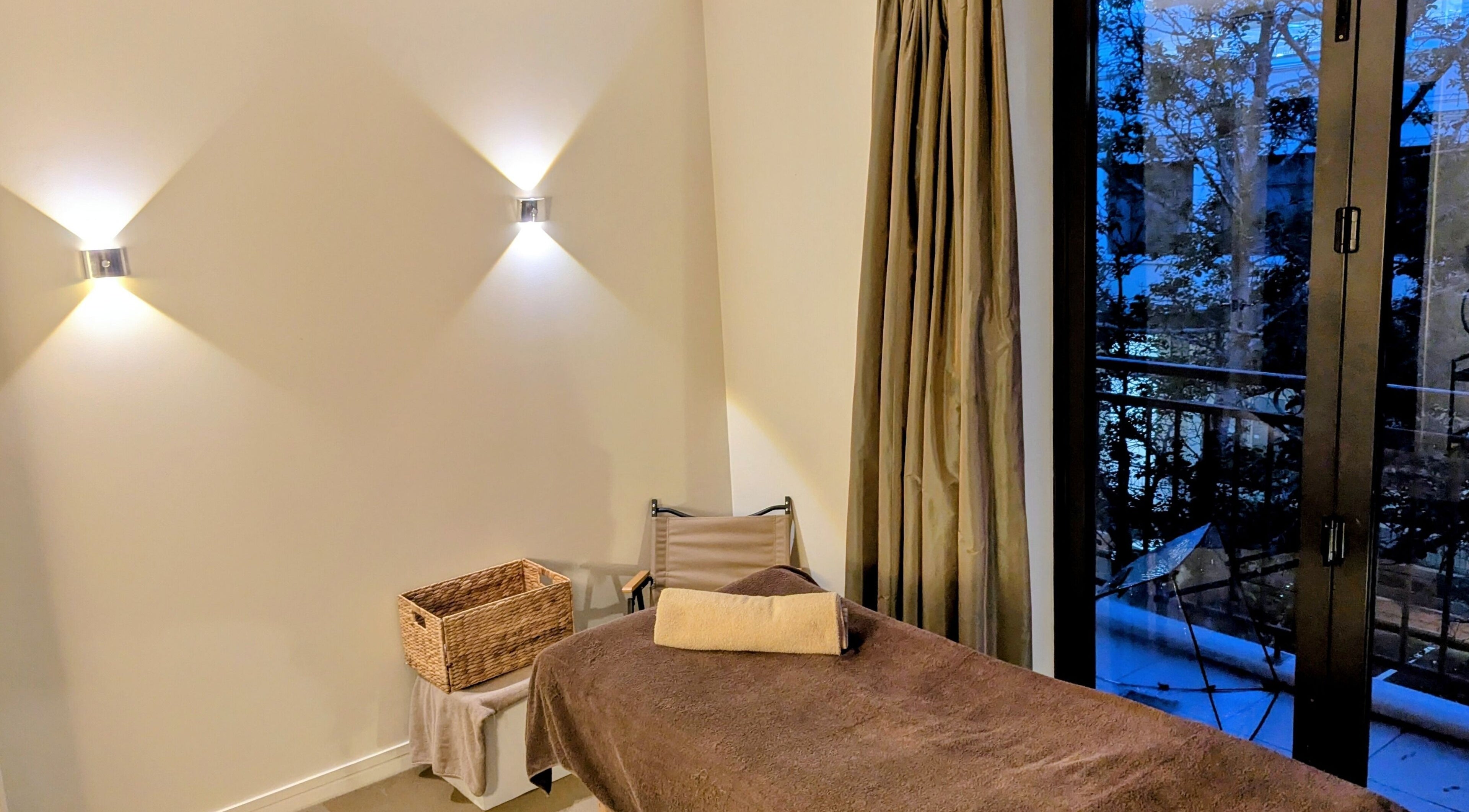 Calm massage room with a bed at Total Body Care Salon BLESS -Japanese Seitai massage-, Auckland, Auckland, NZ.