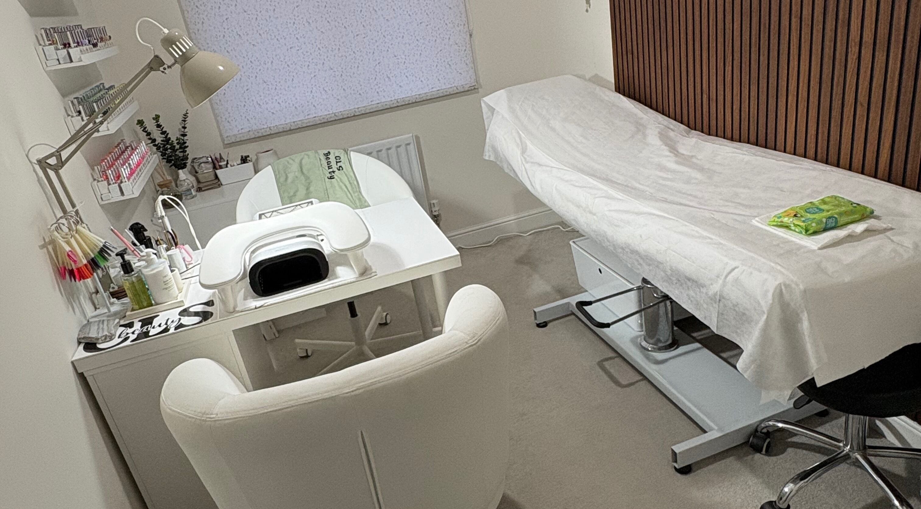 Clsbeauty spa room in Liphook, England, GB featuring treatment table and manicure station.