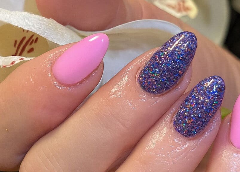 Vibrant pink and glitter nails at Cate Nails, Genève, Genève, CH. A stunning display of artistry.