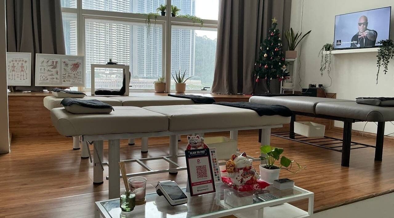 Sleek massage room at Shisei Wellness, Petaling Jaya, Selangor, MY, featuring modern decor and city views.