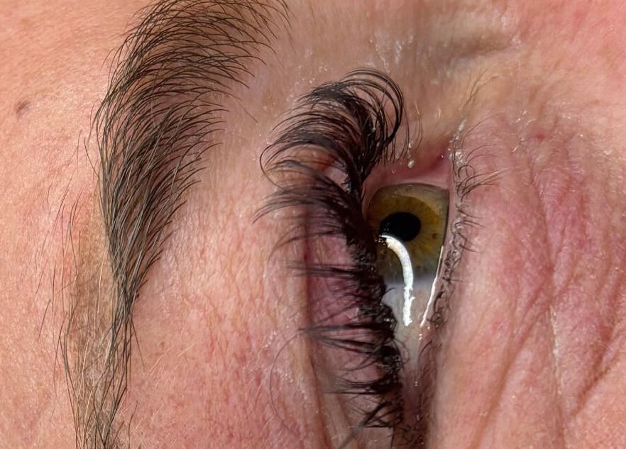 Close-up of eye with curled lashes at Kate's in Axbridge, England, GB.