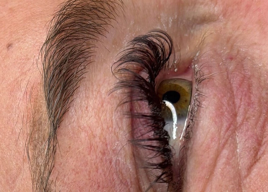 Close-up of eye with curled lashes at Kate's in Axbridge, England, GB.