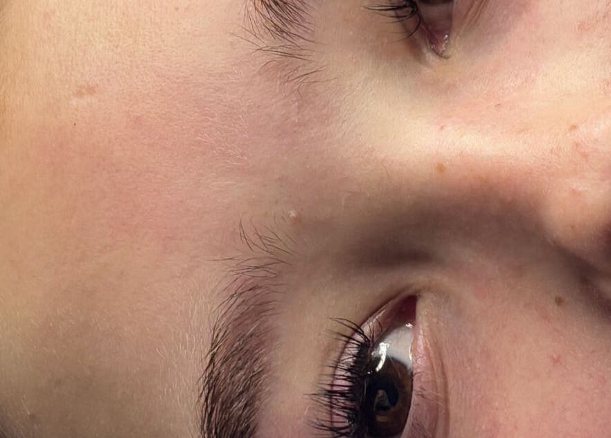 Close-up of an eyelash extension at Kate, Axbridge, England, GB. Detailed view of eyelash enhancement.