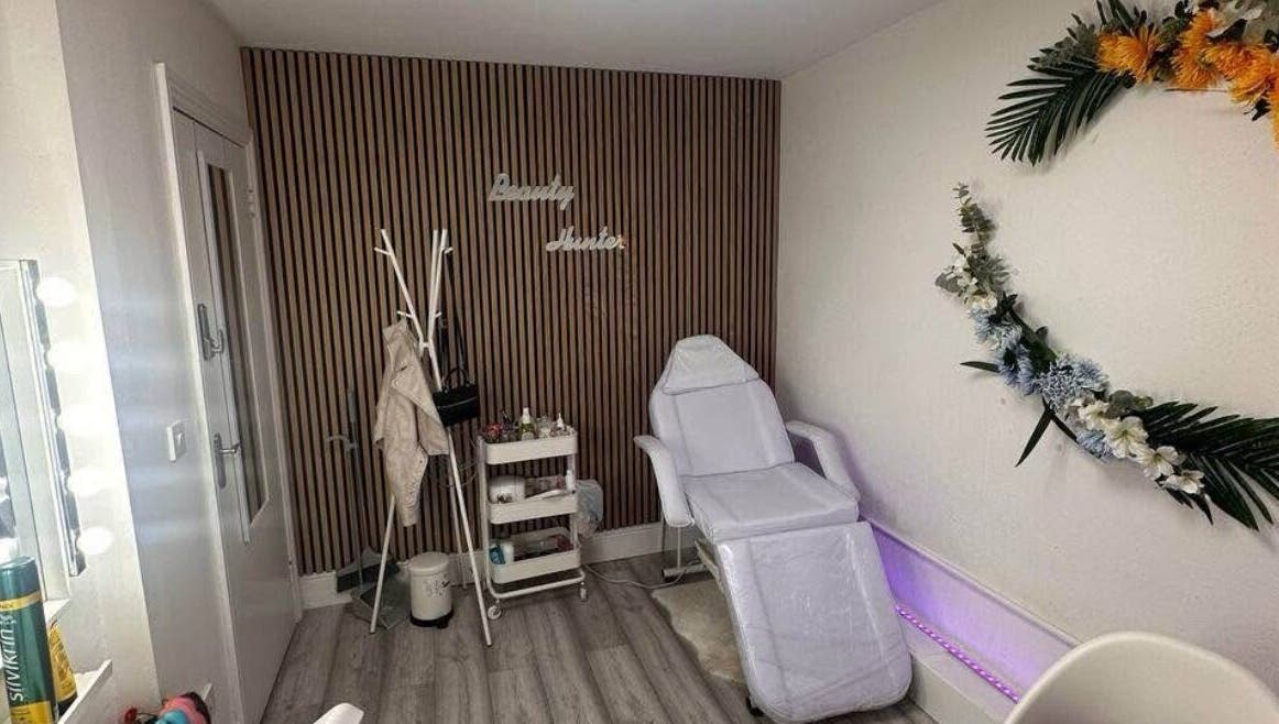 Calming treatment room at Mona Lash, Dublin, County Dublin, IE, featuring treatment chair and decor.
