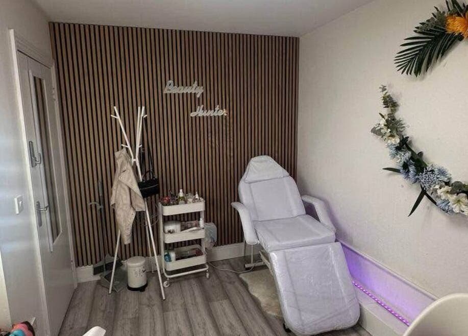 Calming treatment room at Mona Lash, Dublin, County Dublin, IE, featuring treatment chair and decor.