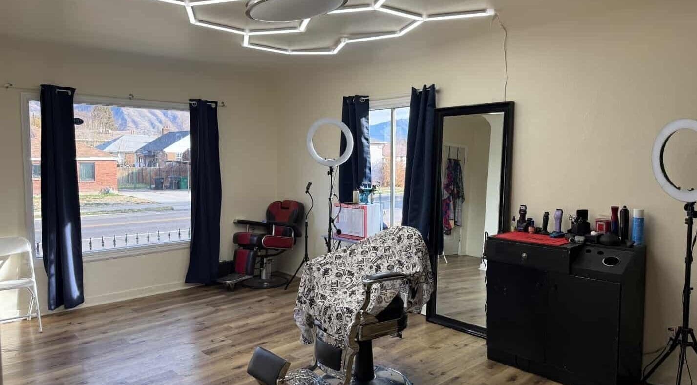 Elegant salon interior at Notorius Blends, Provo, Utah, US featuring a stylish chair and modern lighting.