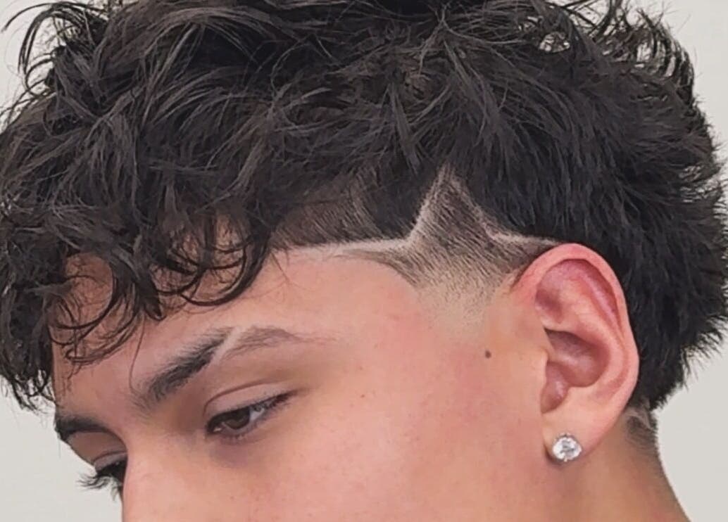 Modern haircut with detailed design at Notorius Blends, Provo, Utah, US. Perfect for trendy styles.