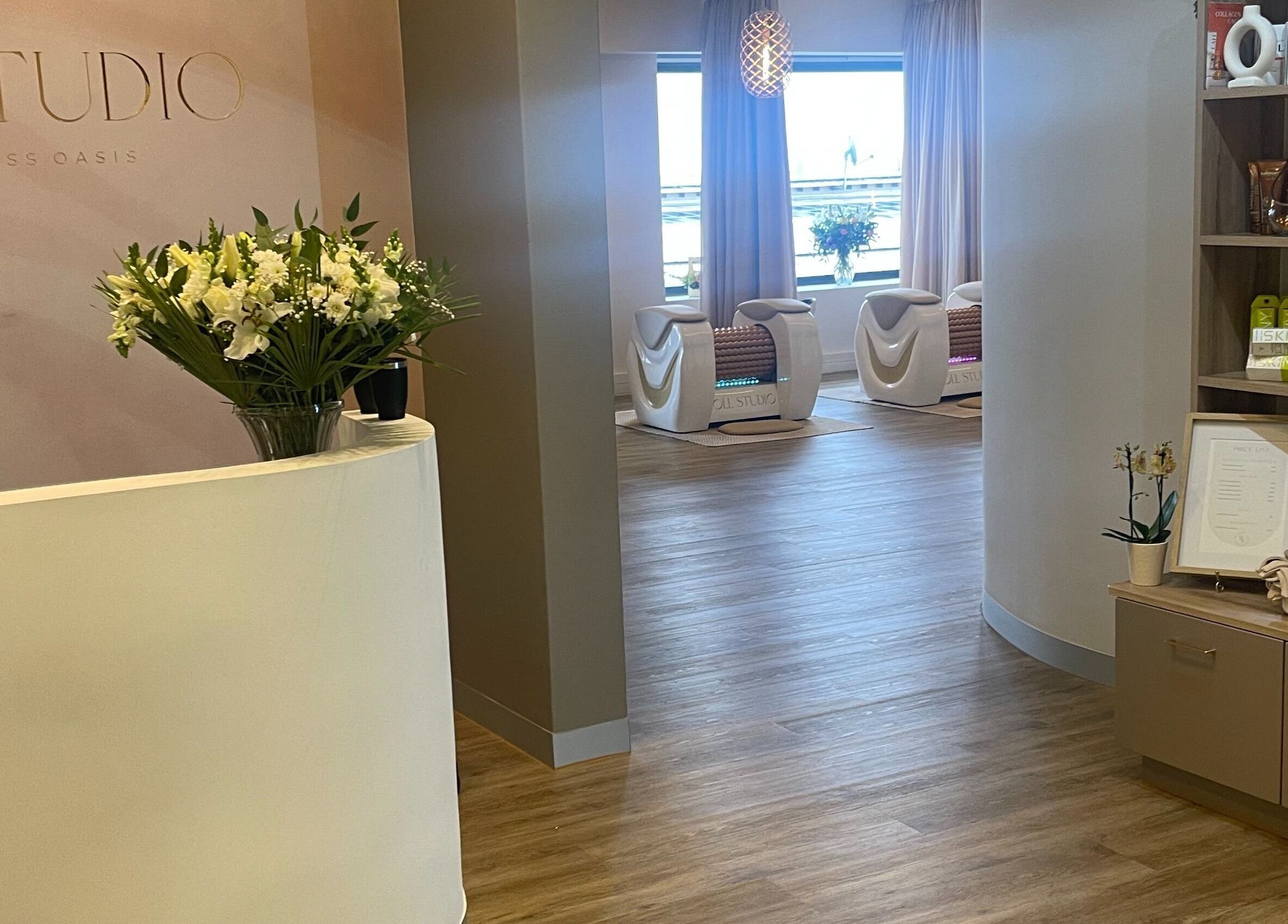 Reception area of Roll Studio in Boksburg, Gauteng, ZA featuring a modern design and wellness products.