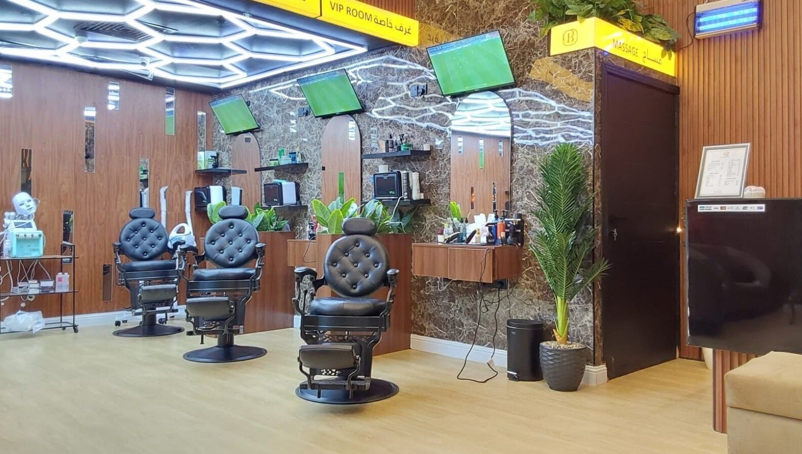 Chic barber chairs at Billionaire Salon – Al Hamra in Jeddah, Makkah Province, SA, offering luxury grooming.