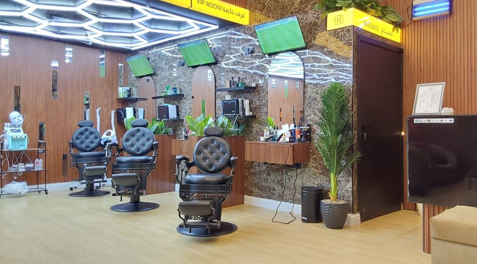 Chic barber chairs at Billionaire Salon – Al Hamra in Jeddah, Makkah Province, SA, offering luxury grooming.