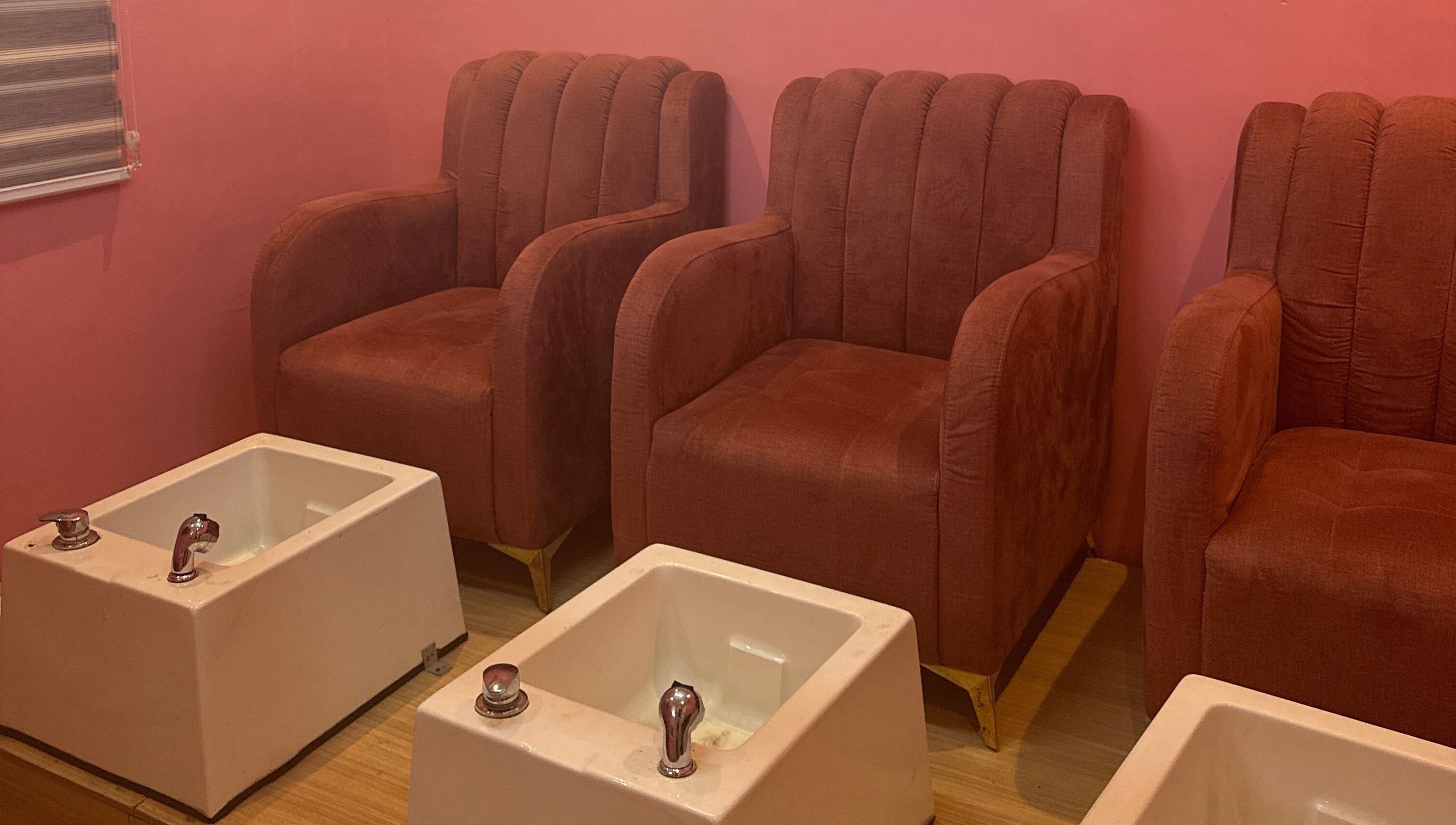 Comfortable pedicure chairs and foot basins at Nailzby.ola, Lagos, Lagos, NG.