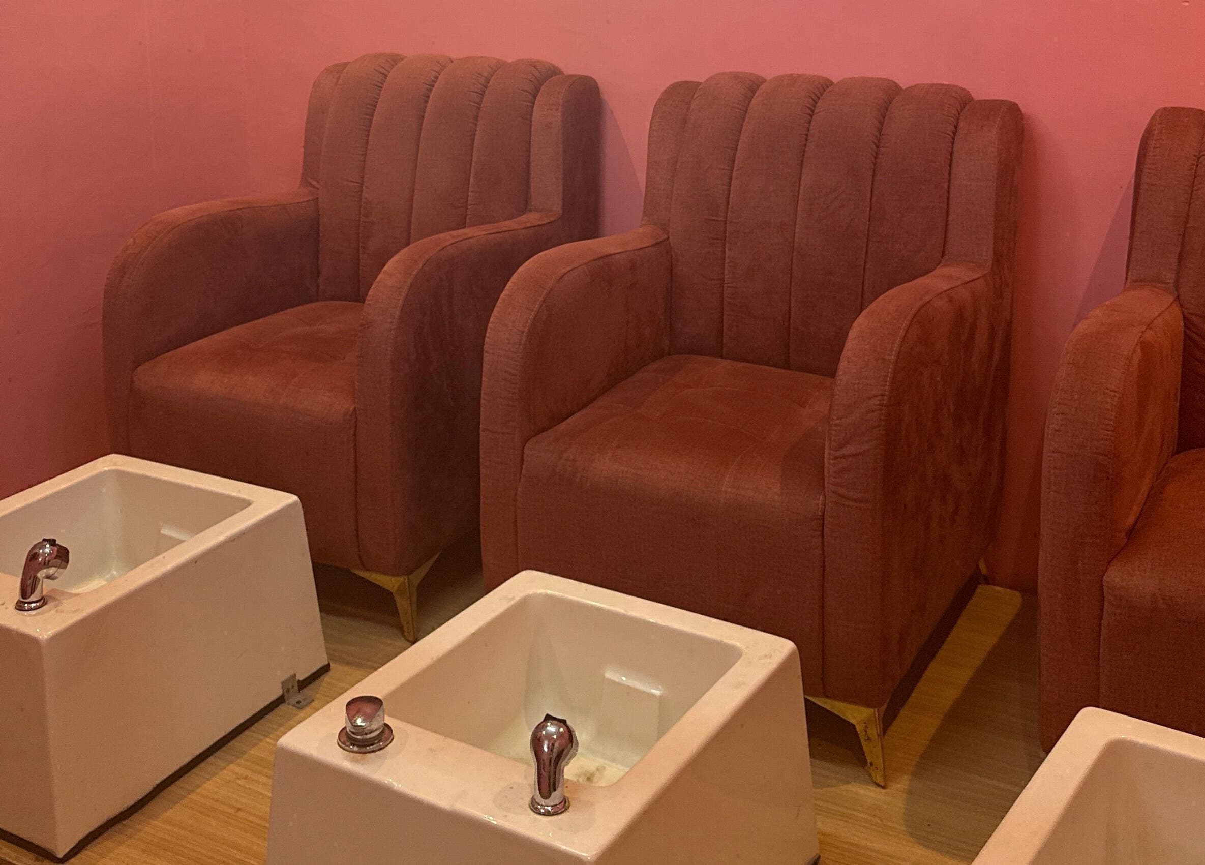 Comfortable pedicure chairs and foot basins at Nailzby.ola, Lagos, Lagos, NG.