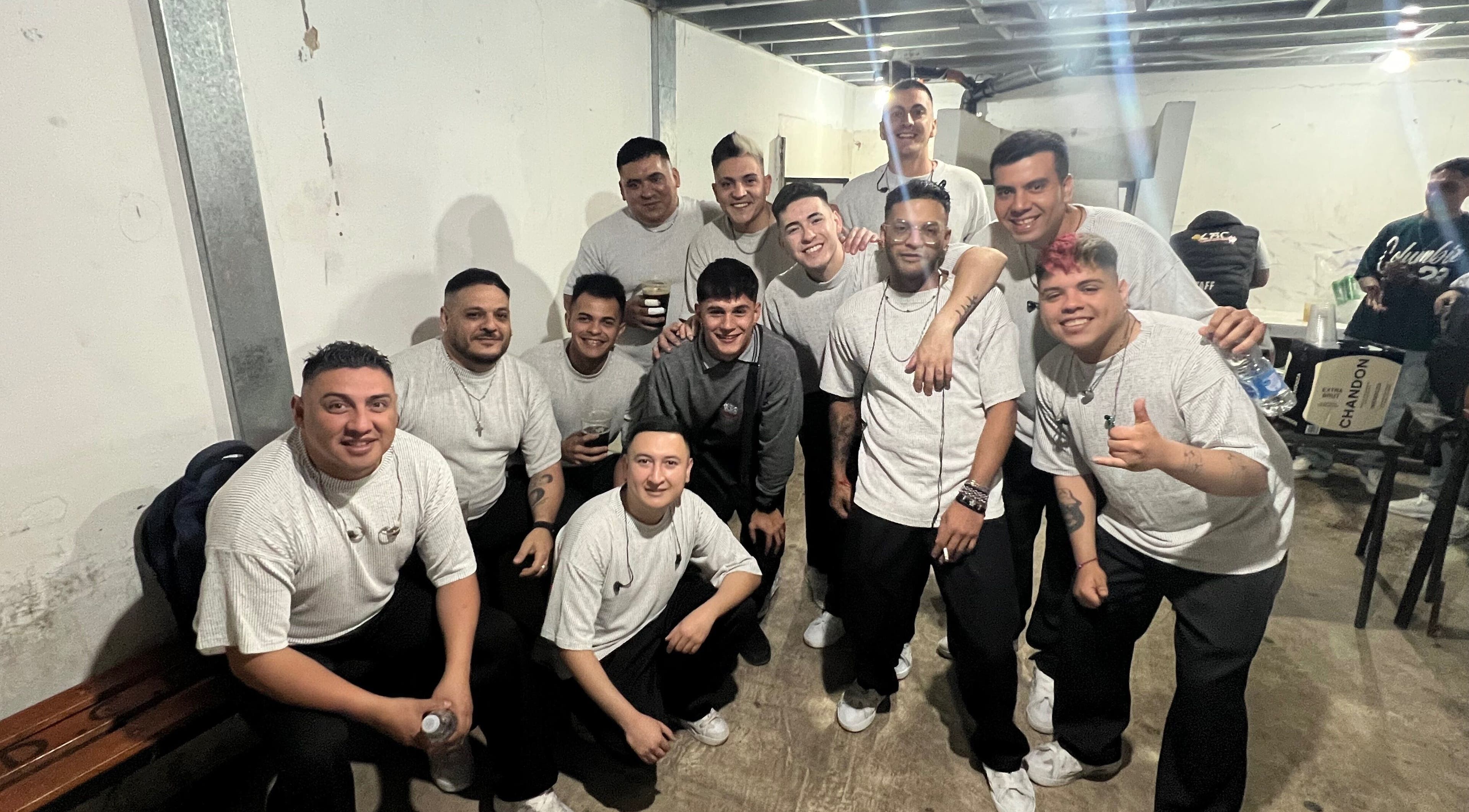 Team at Chispa Barberia smiling in Córdoba, AR. Friendly barbers ready to serve.