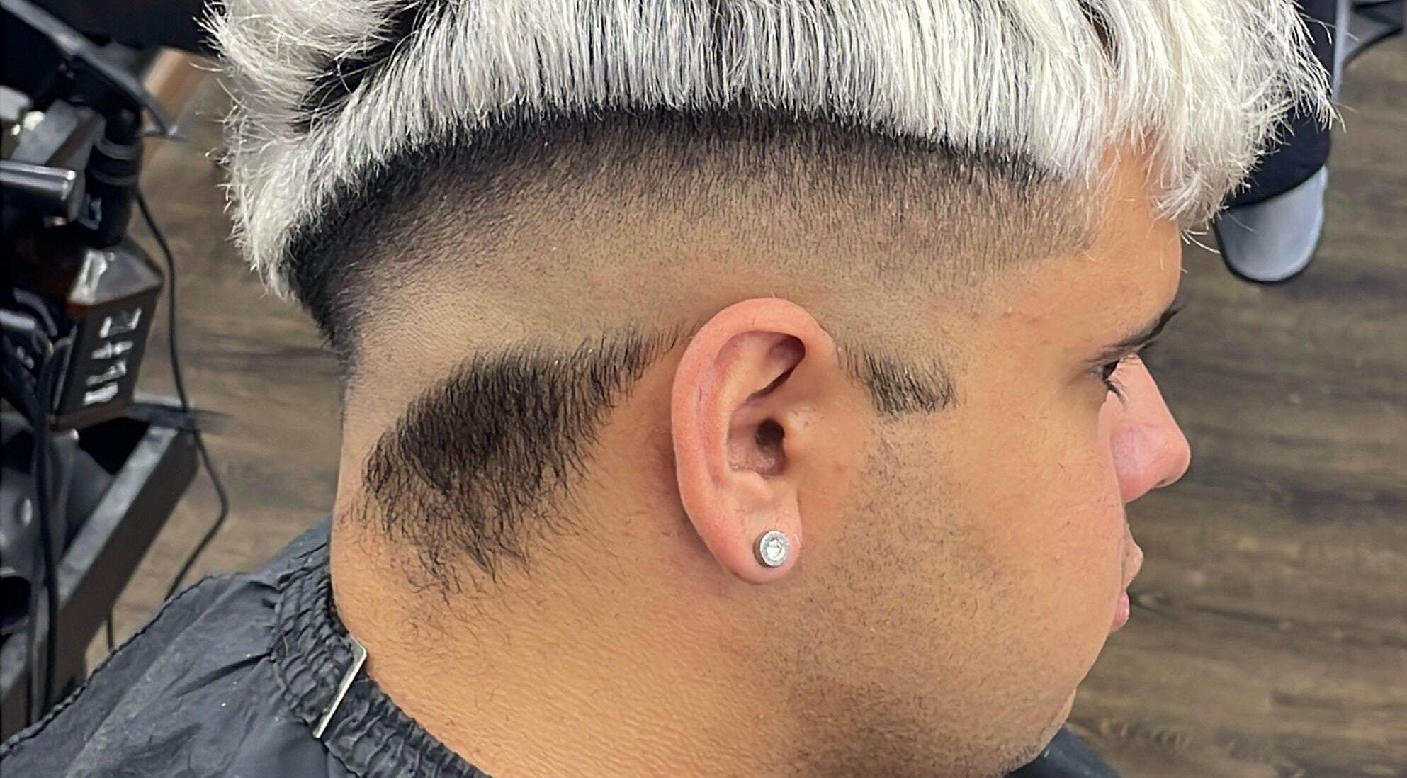 Corte moderno en Gustavo Berrueta, Maldonado, Departamento De Maldonado, UY: degradado y diseño creativo.