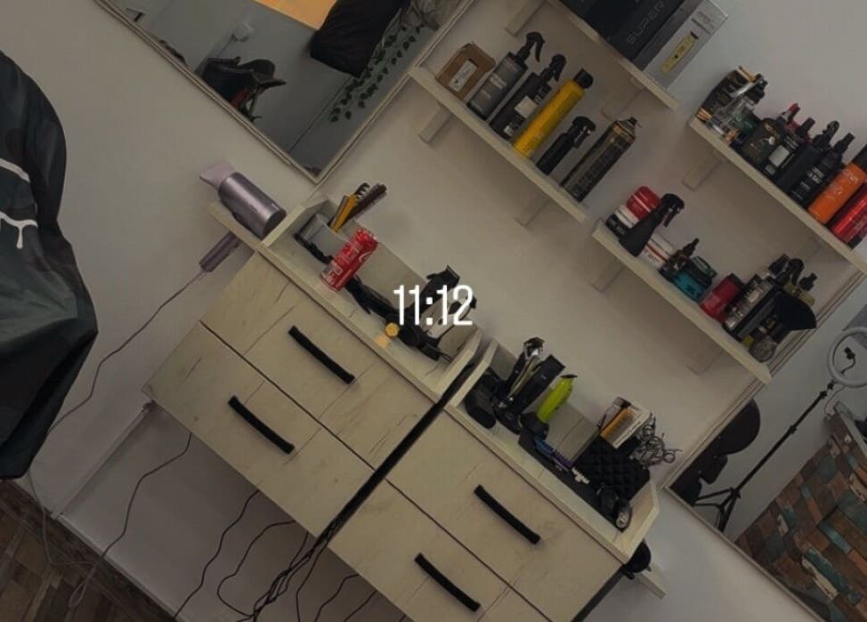 Chic barber workstation at Cristea the Barber, Râmnicu Sărat, Județul Buzău, RO, showcasing grooming products.