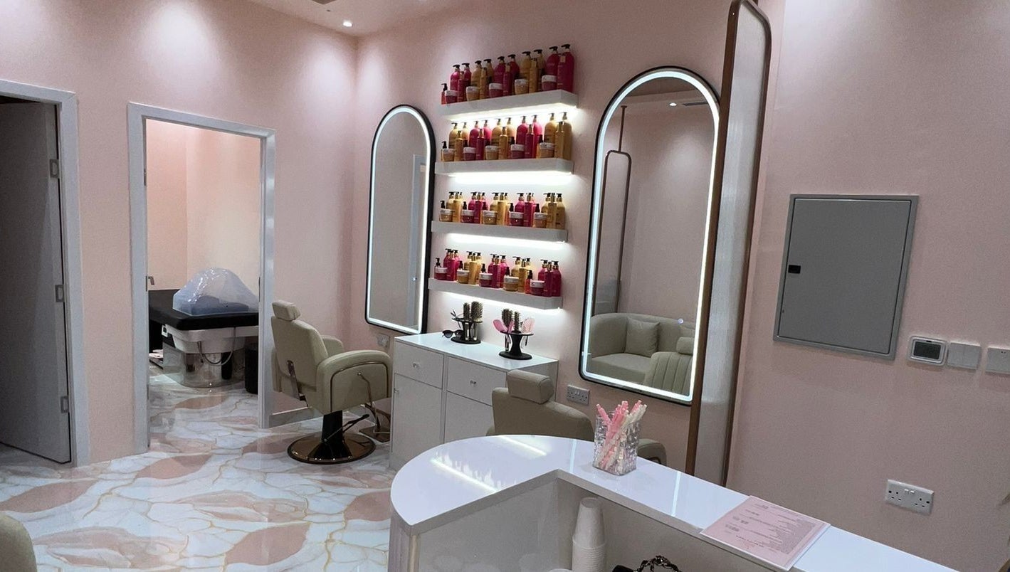 Luxurious salon interior at Crown of Serenity, featuring elegant styling chairs and mirrors in Dubai, Dubai, AE.