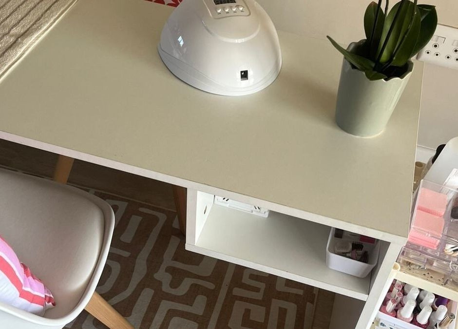 Nail station at Coastal Pearl in Gqeberha, Eastern Cape, ZA featuring manicure tools and greenery.