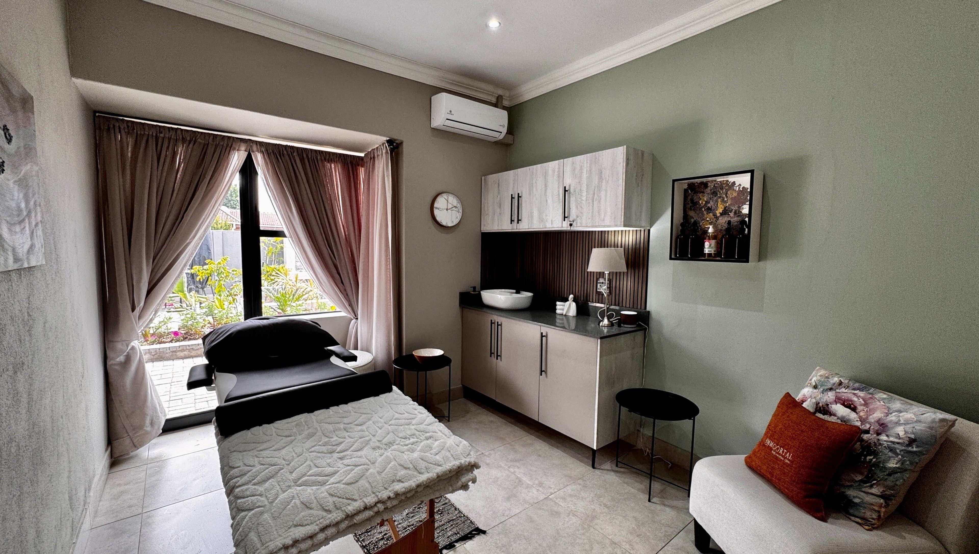 Tranquil treatment room at Immortal Rejuvenation Clinic in Newcastle, Kwazulu-natal, ZA with serene decor.