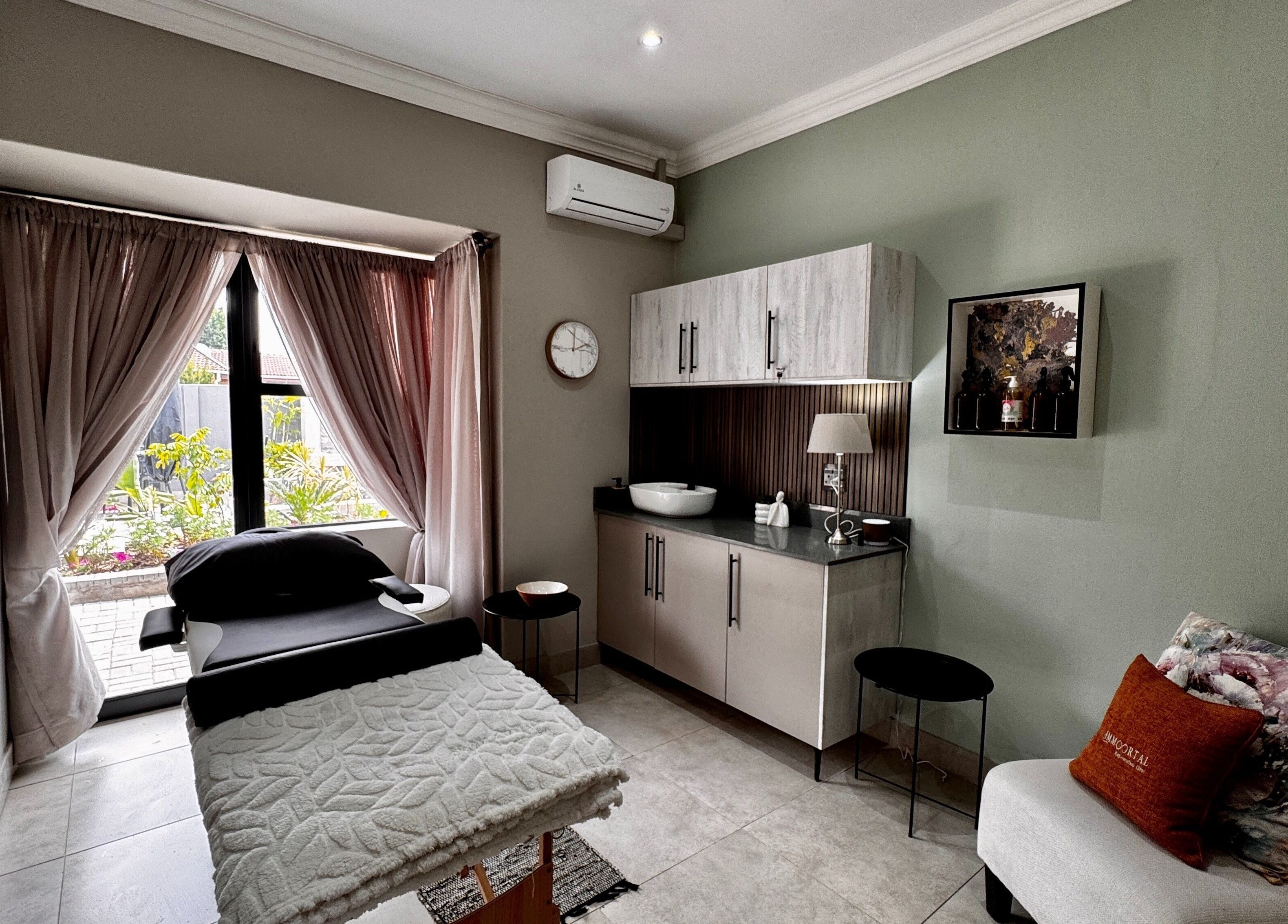 Tranquil treatment room at Immortal Rejuvenation Clinic in Newcastle, Kwazulu-natal, ZA with serene decor.
