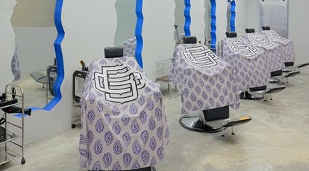 Stylish barber chairs at BELLO&CO. BARBERSHOP, Kajang, Selangor, MY, with unique mirrored accents.