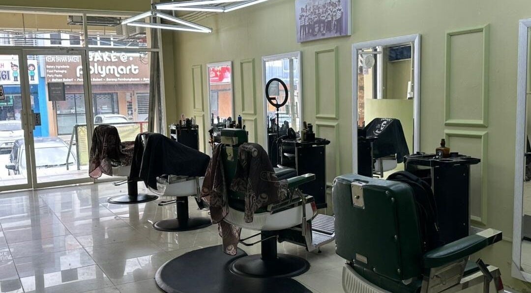 Modern barber chairs at Bello&Co. Barbershop, Kajang, Selangor, MY, offering a sleek and inviting atmosphere.