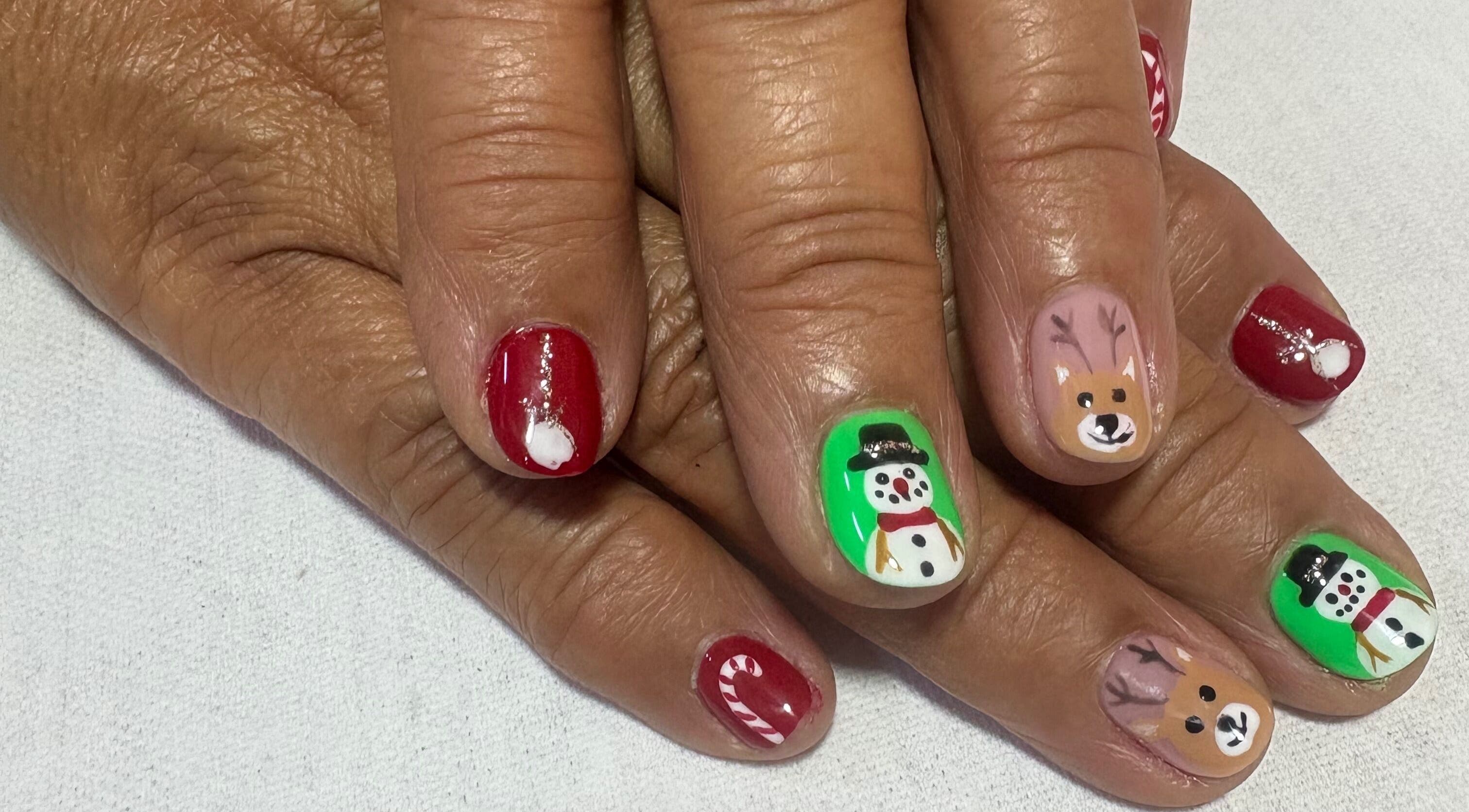 Festive nail art with snowmen and reindeer at Spa Sandra Garcia, Bogotá, D.c., Bogotá, D.c., CO.